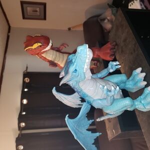 Blue and Red Dinosaur Action Figures